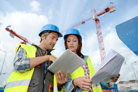 Construction Workers in hats training